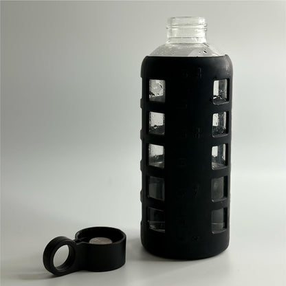 purifyou 40oz / 32oz / 22oz / 12oz Borosilicate Glass Water Bottle with Time & Volume Markers, Silicone Sleeve, Stainless Steel Lid | Reusable Glass Bottle for Water & Juice (40oz Jet Black)