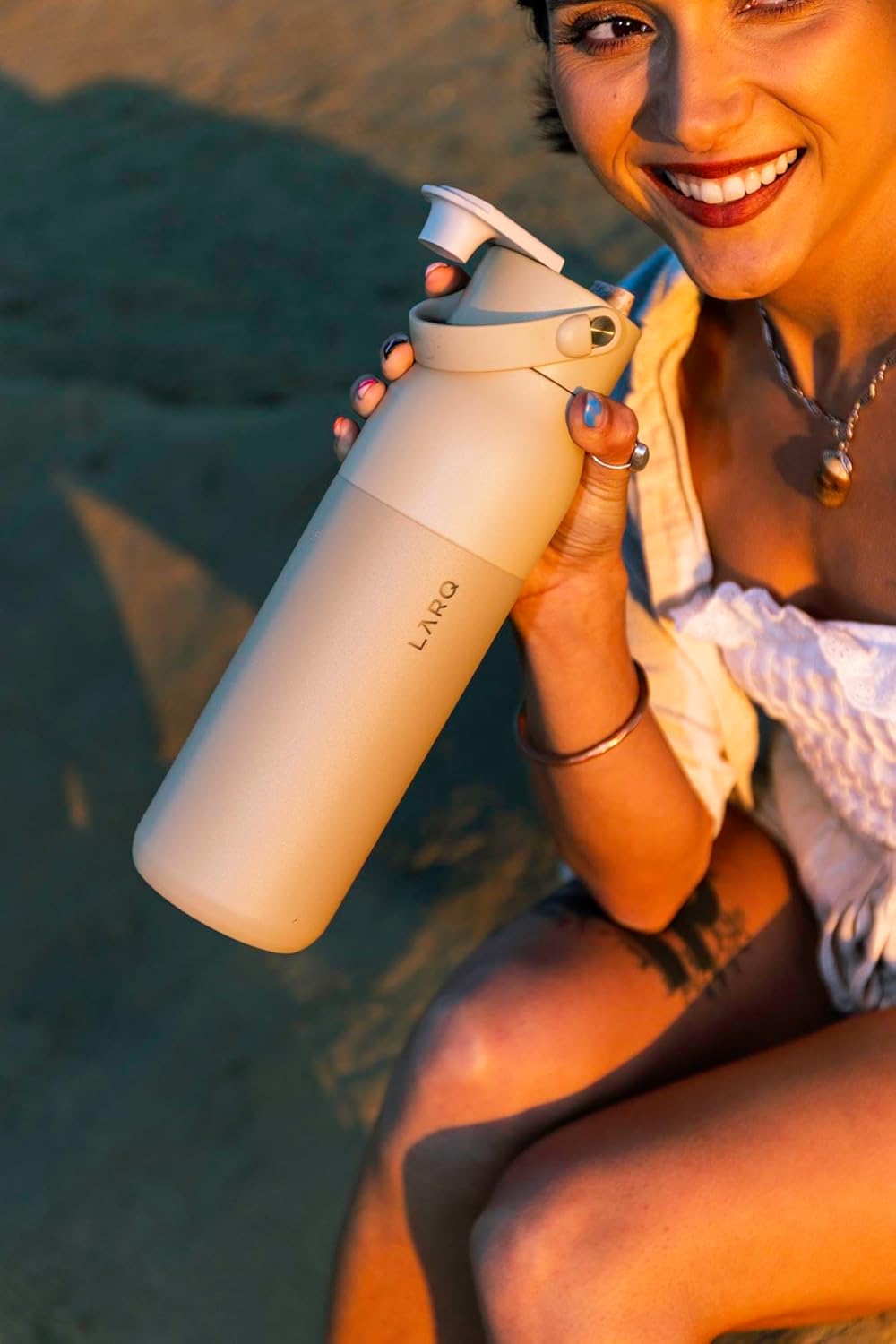 LARQ Bottle Swig Top 34oz - Insulated Stainless Steel Water Bottle With Built-In Silicone Handle | BPA Free | Reusable Water Bottle for Sports, Gym, and Travel, Obsidian Black