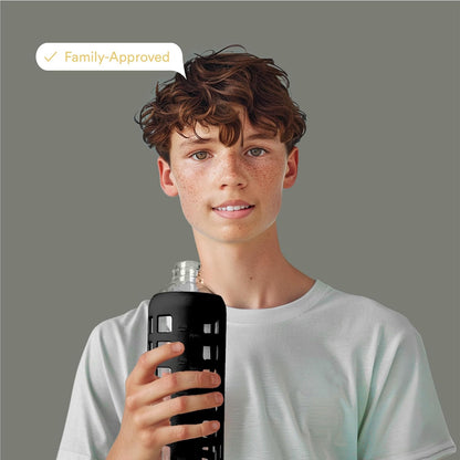 purifyou 40oz / 32oz / 22oz / 12oz Borosilicate Glass Water Bottle with Time & Volume Markers, Silicone Sleeve, Stainless Steel Lid | Reusable Glass Bottle for Water & Juice (40oz Jet Black)