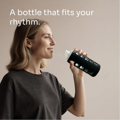 purifyou 40oz / 32oz / 22oz / 12oz Borosilicate Glass Water Bottle with Time & Volume Markers, Silicone Sleeve, Stainless Steel Lid | Reusable Glass Bottle for Water & Juice (40oz Jet Black)
